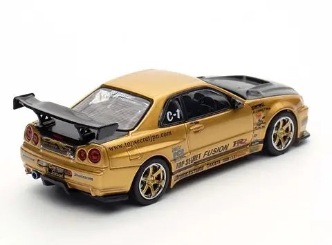 INNO64 NISSAN SKYLINE GT-R R34 TOP SECRET GOLD