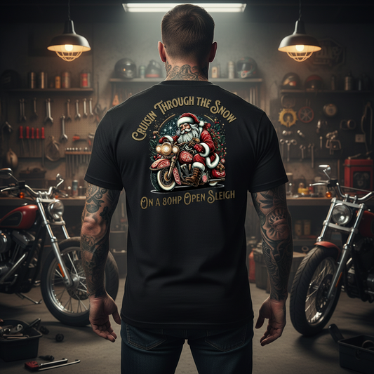 Biker guy wearing black Santa Cruising Bike T-Shirt in garage