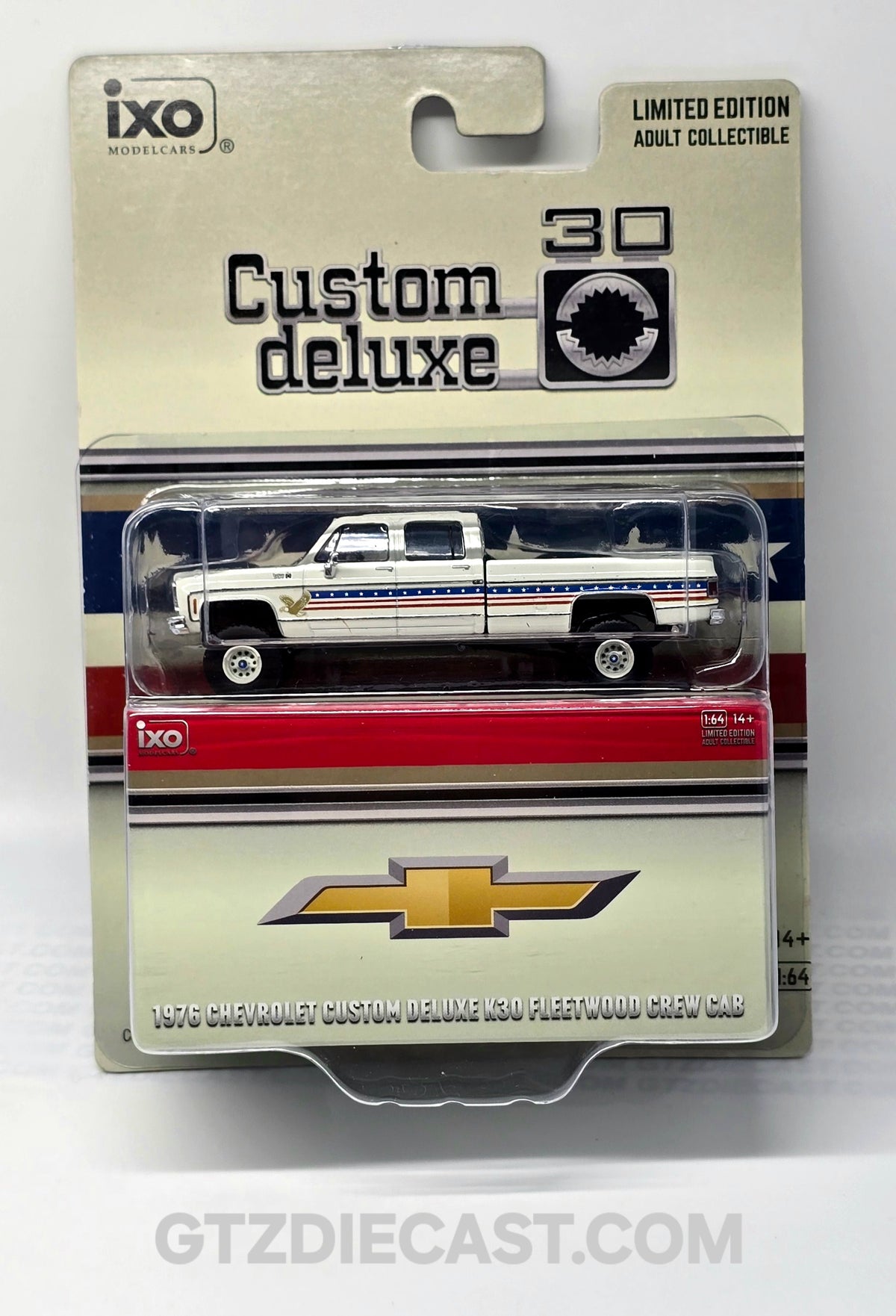 IXO Model 1:64 1976 Chevrolet Custom Deluxe K30 Fleetside 250th Anniversary Edition – White