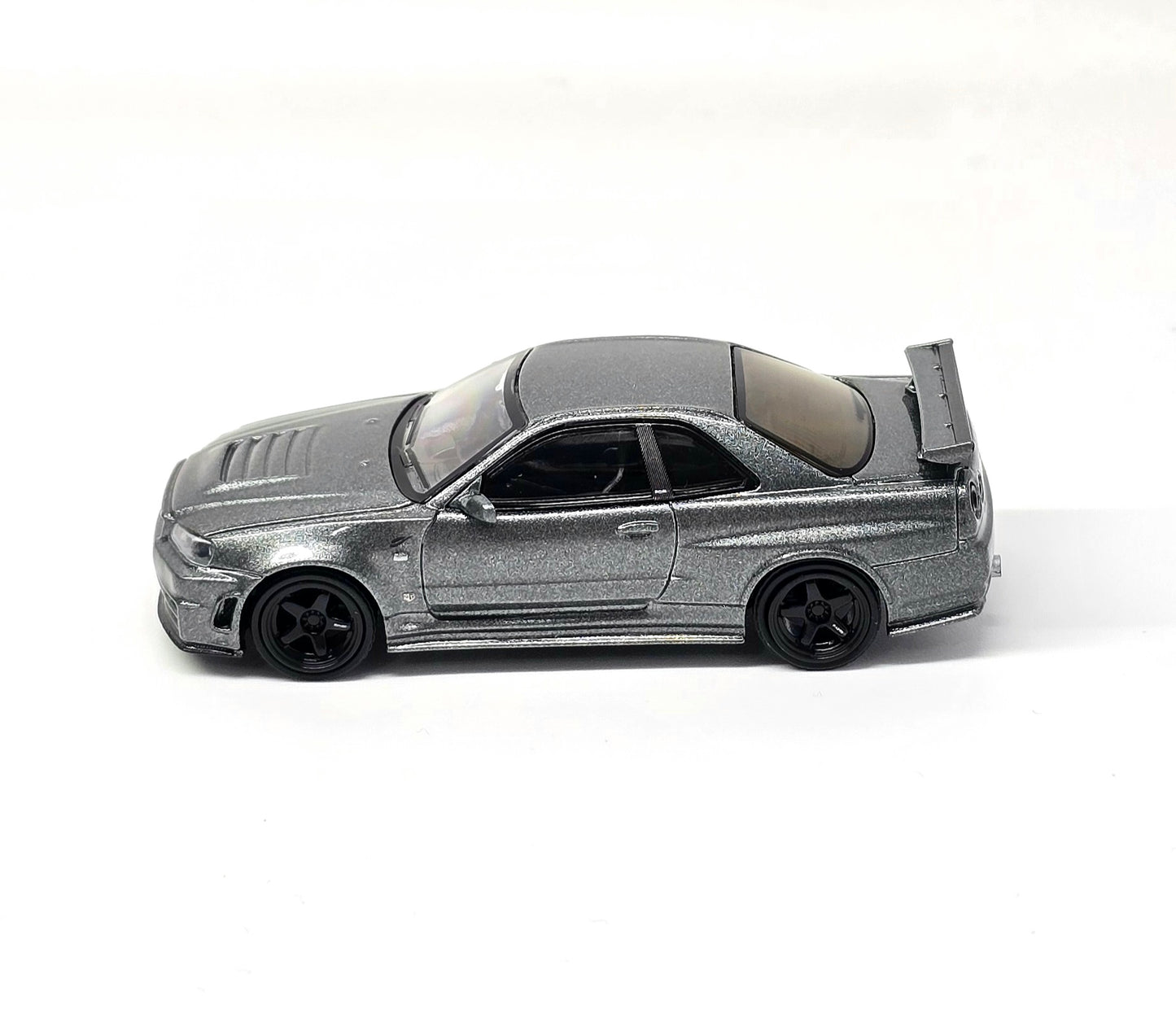 Mini GT 1:64 Nissan Skyline GT-R Dark Metal Gray (NISMO BNR34 CRS Version)
