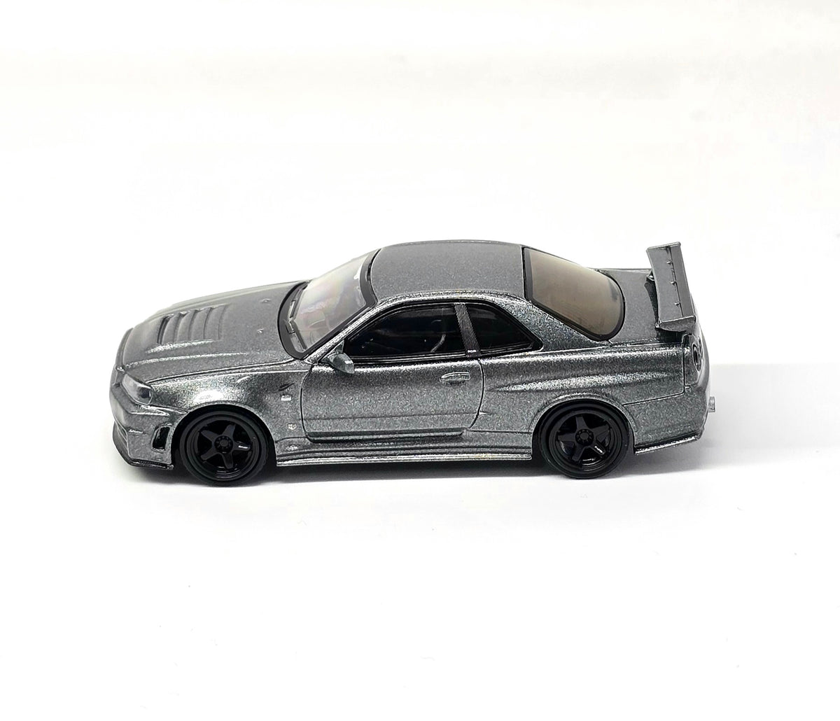 Mini GT #1160 1:64 Nissan Skyline GT-R Dark Metal Gray (NISMO BNR34 CRS Version)